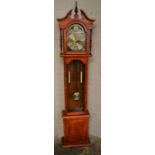 Modern 31 day grandmother clock with spring driven mechanism