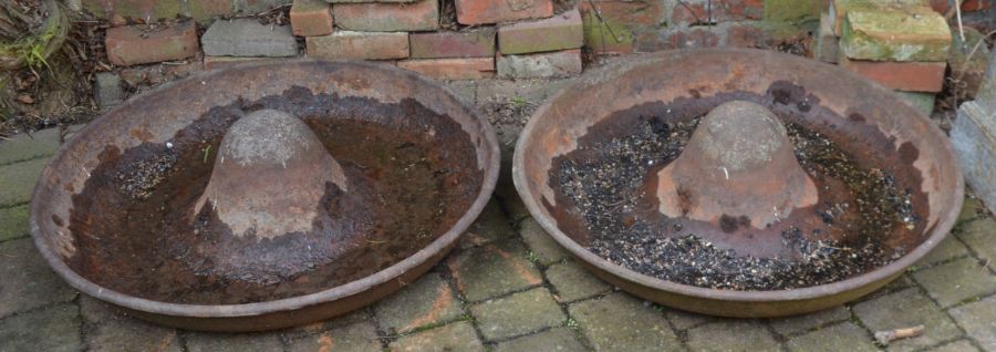 Pair of sombrero Mexican hat cast iron pig feeders. Dia 88cm