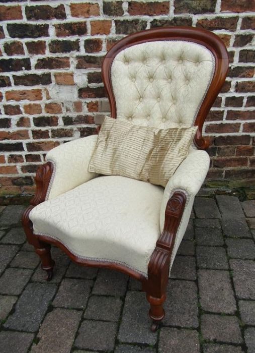 Victorian mahogany framed armchair on castors