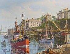 Framed oil on canvas depicting fishing vessels in Brixham harbour by W H Stockman (1935-2021) 62cm x