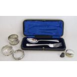 Collection of silver to include Henry Williamson cased spoon and fork, napkin rings, pill box
