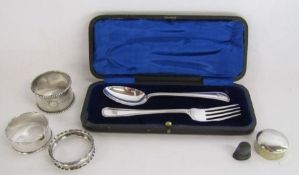 Collection of silver to include Henry Williamson cased spoon and fork, napkin rings, pill box