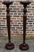 Pair of mahogany torcheres 127.5cm tall