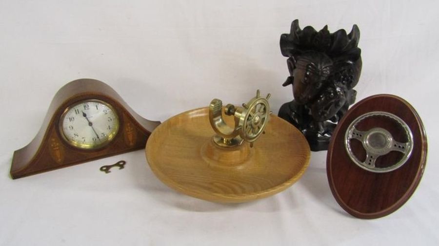 8 day mantel clock with inlaid decoration, ships wheel nut cracker, wooden carved heads and