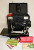 Singer electric sewing machine, model 222K, in original box with papers & accessories