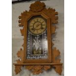 Late 19th century wall hanging kitchen clock by Ansonia Clock Co. of America with 8 day spring