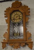 Late 19th century wall hanging kitchen clock by Ansonia Clock Co. of America with 8 day spring