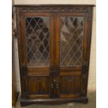 Oak display cabinet with linen fold doors Ht 140cm L 98cm