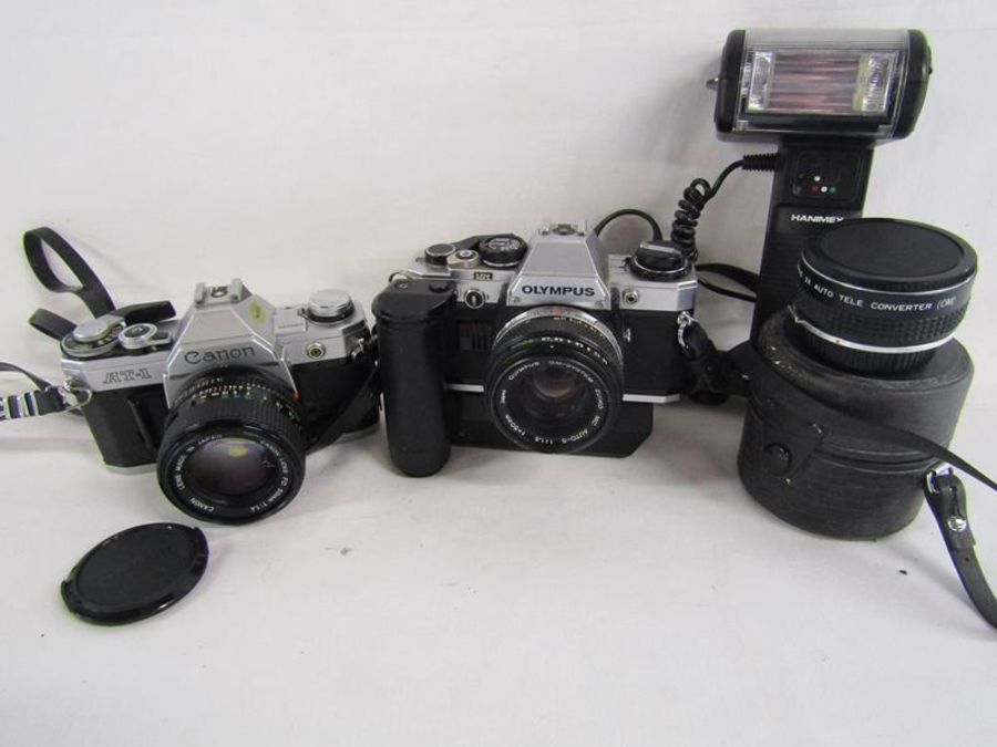 Canon AT-1 camera, Olympus CM10 camera, Sirius tele-converter lens and Haminex flash,