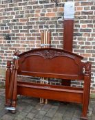 Carved mahogany four poster double bed (crack to one foot)