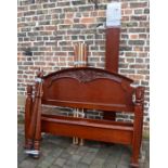 Carved mahogany four poster double bed (crack to one foot)