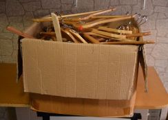 *Box of wooden coat hangers - some branded