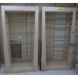 *2 large modern display units with glass shelves 200cm high x 100cm wide Shelf sizes 97cm by 49cm