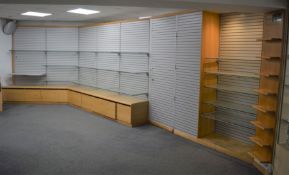 *Josef Seibel advertising wall unit comprising 12 grey slatted boards with brackets & glass