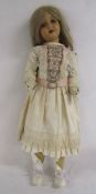 3ft antique composition walking doll with dress and petticoats - head turns with leg movement