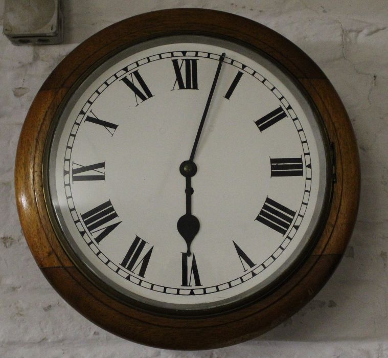 Mahogany framed wall clock with fusee movement, the dial painted with Roman numerals surrounded by