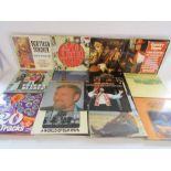 Collection of 12" vinyl records includes - Patsy Cline, Petula Clark, Elvis, Status Quo, Cliff