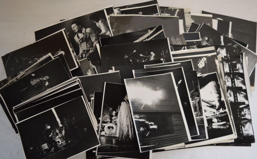 Large quantity of reprint photographs of rock bands in concert including Screaming Lord Sutch &