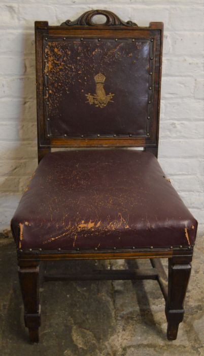 Sturdy early 20th century oak chair with the motto Tam Marte Quam Minerva possibly from the