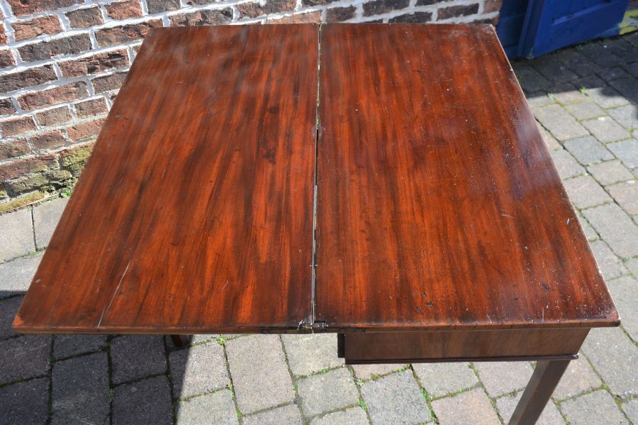 Georgian mahogany fold over tea table with under drawer with swan neck handles. Top opening to - Image 3 of 3