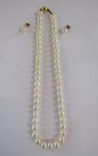 Pearl necklace with 9ct gold clasp and matching earrings approx. 37cm length