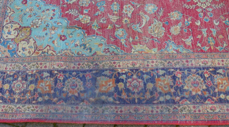 Rich red ground Persian Tabriz carpet with floral medallion & blue border 346cm by 259cm - Image 5 of 5