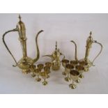 Collection of brass Dallah tea/coffee pots with brass cups