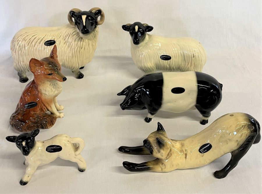 Selection of Coopercraft ceramic animals, including two rams, lamb, fox, pig and cat