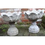 Pair of concrete tulip pattern urns