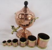 Copper and brass samovar and The Oriental Metal Pressing Works Bombay graduated measuring cups