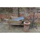 Wooden wheel barrow, wrought iron 3 tier planter, chimney pot & a piece of Welsh slate