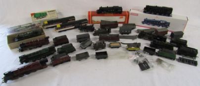 Collection of 00 gauge mostly cast trains and wagons includes 70000, 2345, 2546, plastic kitmaster