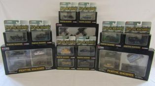 Collection of boxed Corgi fighting machines includes tanks, planes and vehicles