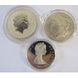 Brittania one ounce fine silver 1999 coin, United States of America one dollar 1889 and National