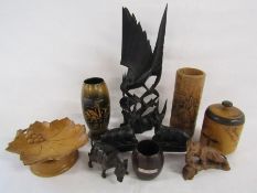 Collection of wooden items to include musical grape leaf dish, ebonised bird and other animals,