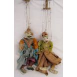 Pair of Burmese marionette puppets - with original clothing and Burmese dha (swords) - approx.