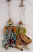 Pair of Burmese marionette puppets - with original clothing and Burmese dha (swords) - approx.