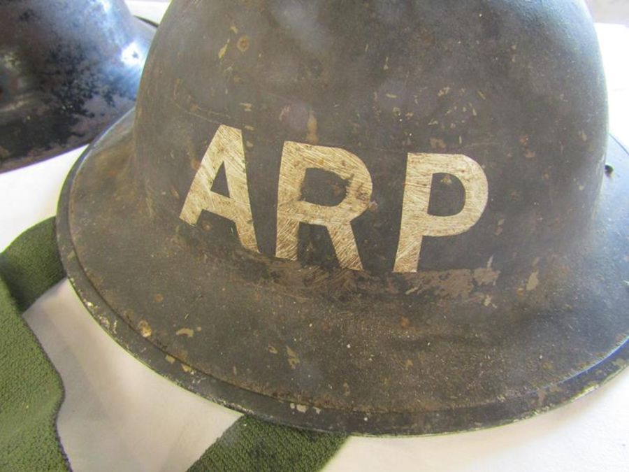 WWII cycle carrier dated 1945, WWII child's steel helmet and a WWII ARP helmet appears marked F&L 87 - Image 2 of 6