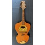 Early 20th century mandolinetto with shield shape back, bone tuning pegs & ivorine pickguard,