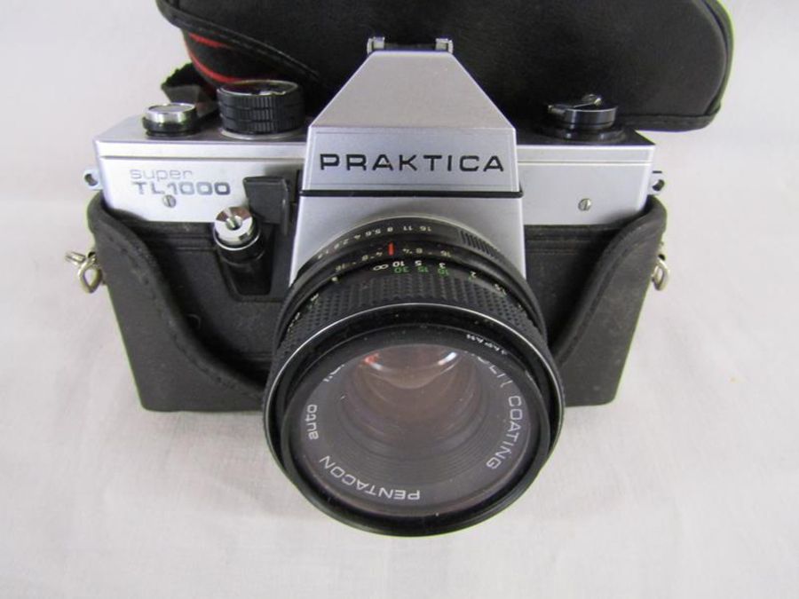 Cameras includes Olympus OM-2 camera with Vivitar macro focusing lens, Olympus Zuiko lens, Pentax A3 - Image 13 of 14