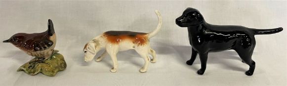 3 Beswick figures, including a black Labrador, hound and a wren