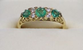 18ct gold three stone emerald & diamond gypsy ring size M / N 3.9g