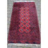 Red and blue Persian rug, L190cm x W101cm