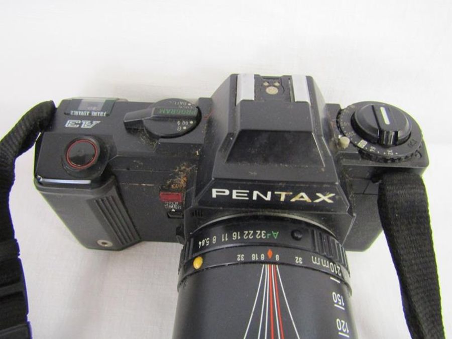 Cameras includes Olympus OM-2 camera with Vivitar macro focusing lens, Olympus Zuiko lens, Pentax A3 - Image 8 of 14