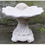 Concrete shell bird bath