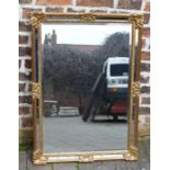 Ornate gilt framed wall mirror, H95cm x 68cm