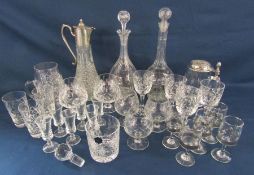 Decanters, claret jug, crystal glasses including brandy and wine glasses also some sherry glasses