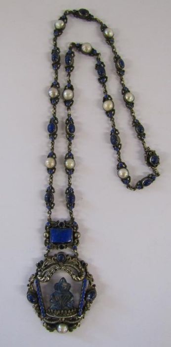 Lapis Lazuli and pearl set in white metal necklace with Buddhist design pendant