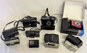 Selection of film and digital cameras, including Kodak Instamatic 33, Kodak S Series, FujiFilm