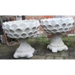 Pair of concrete dahlia pattern urns